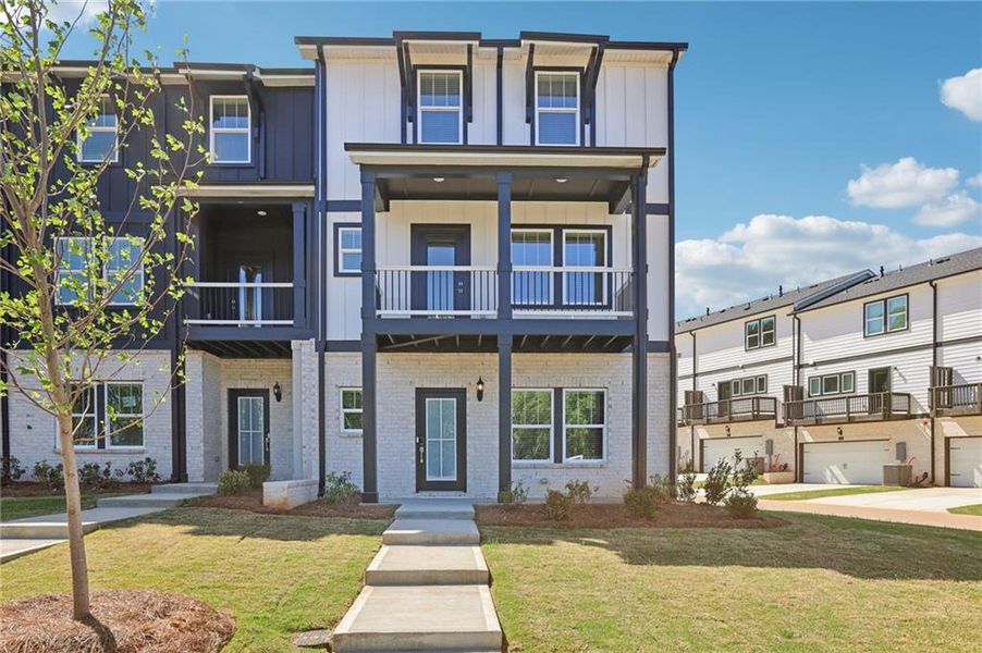 Front exterior of a new home in Hemingway - Highland Series, Cumming, GA, highlighting curb appeal (Image 24).