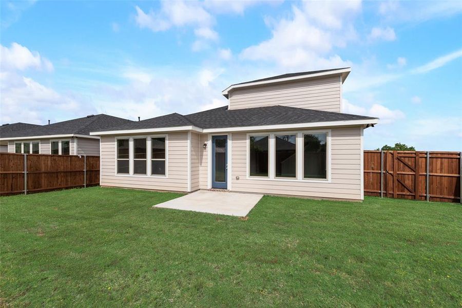 Front exterior of a new home in Creekside of Crowley, Crowley, TX, highlighting curb appeal (Image 18). Front exterior of a new home in Creekside of Crowley, Crowley, TX, highlighting curb appeal (Image 18).