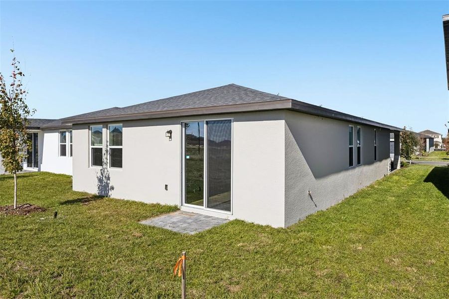 Exterior details and patio area of a home in Crosswinds - Classic Series, Haines City (Image 22).