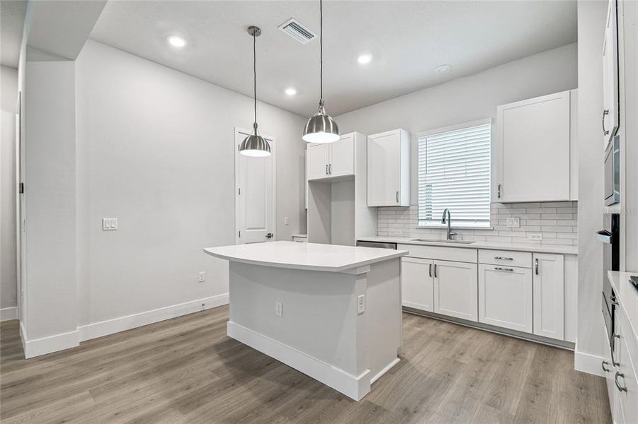 Furnished interior view inside a new home in Towns at Union, St. Petersburg (Image 11).