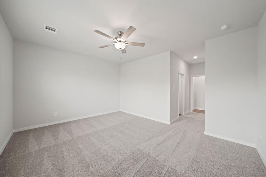 Spacious, unfurnished interior of a new home in Lonestar Collection at Paloma at Sanford Farms, Waller (Image 16).