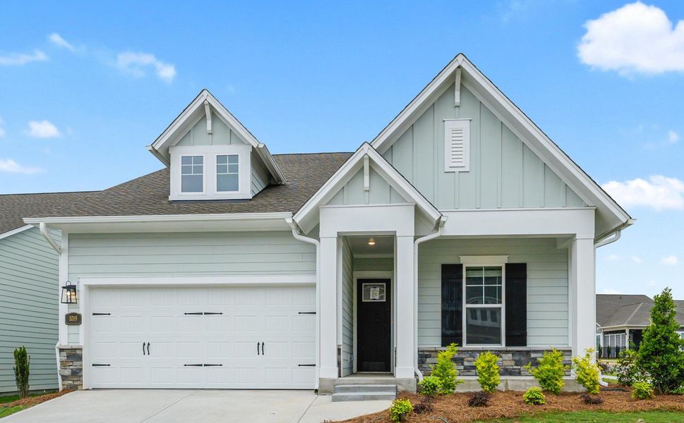 Front exterior of a new home in Encore at Streamside - Classic Series, Waxhaw, NC, highlighting curb appeal (Image 2). Front exterior of a new home in Encore at Streamside - Classic Series, Waxhaw, NC, highlighting curb appeal (Image 2).