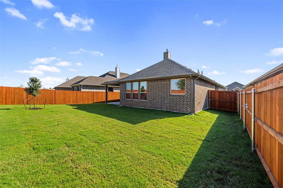 Exterior details and patio area of a home in Morningstar, Aledo (Image 21).