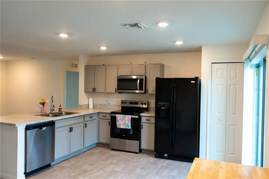 Furnished interior view inside a new home in , Port Charlotte (Image 4).