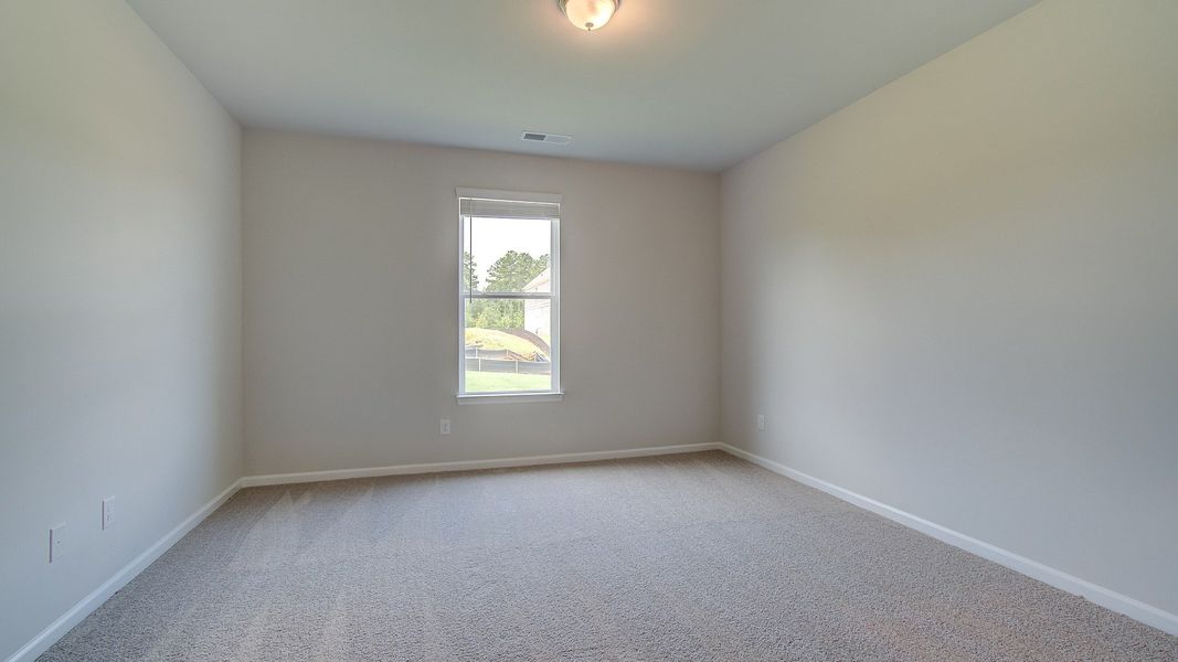 Furnished interior view inside a new home in Westwind Estates, Hampton (Image 6).