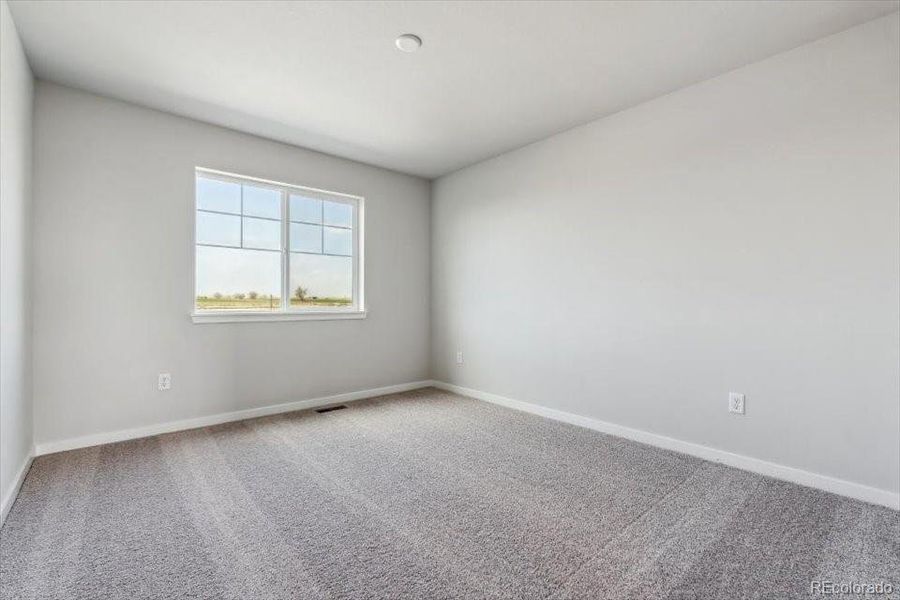 Spacious, unfurnished interior of a new home in Red Barn Meadows, Mead (Image 24).