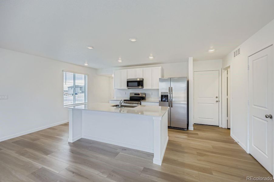 Furnished interior view inside a new home in Copper Chase: The Celestial Collection, Colorado Springs (Image 6).