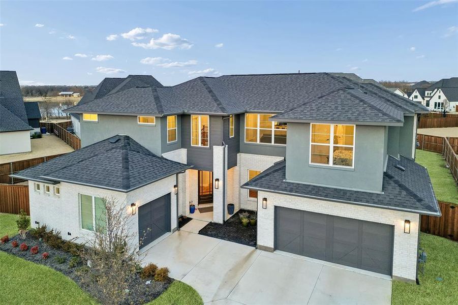 Front exterior of a new home in , Celina, TX, highlighting curb appeal (Image 23).