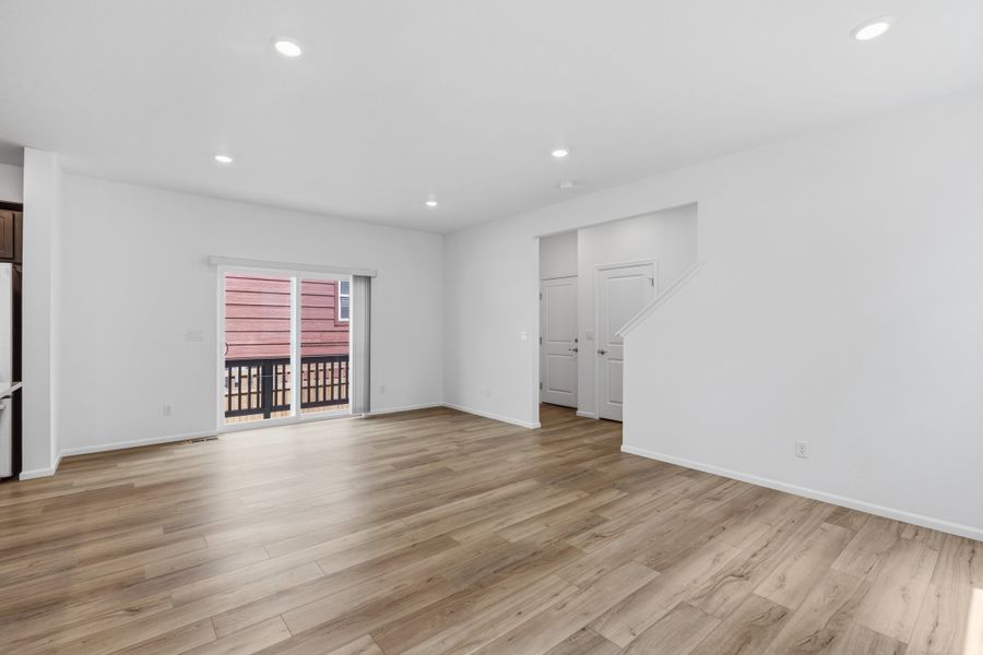 Spacious, unfurnished interior of a new home in Woodrose at Painted Prairie, Aurora (Image 11).