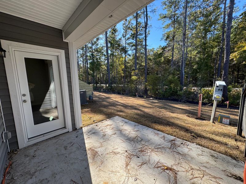 Exterior details and patio area of a home in Hammock Walk at Nexton, Summerville (Image 3). Exterior details and patio area of a home in Hammock Walk at Nexton, Summerville (Image 3).