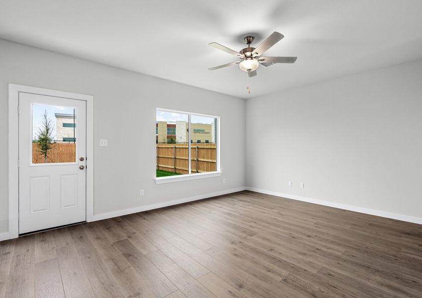 The family room has a large window that lets in great, natural light. The family room has a large window that lets in great, natural light.