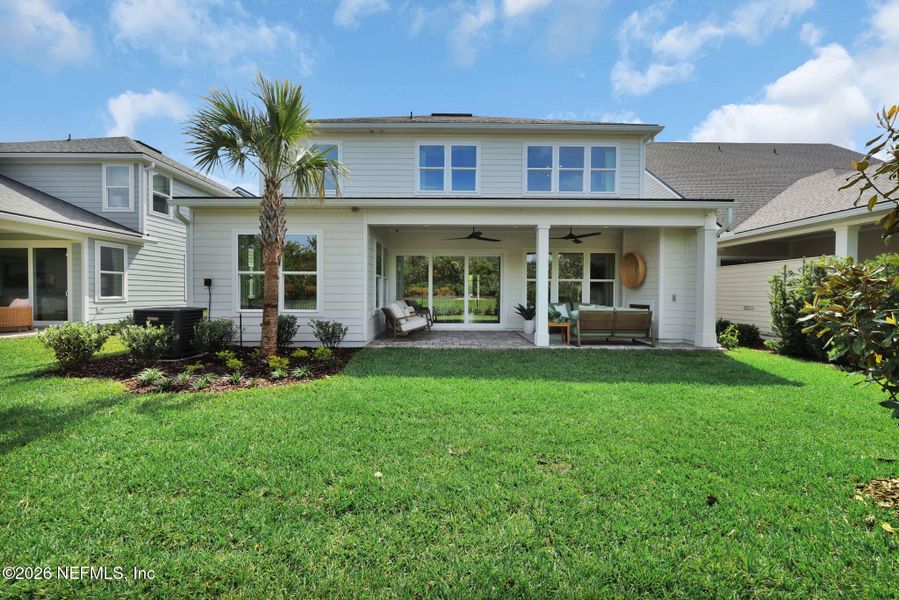 Exterior details and patio area of a home in Mariposa at EverRange 40' Series, Jacksonville (Image 28).