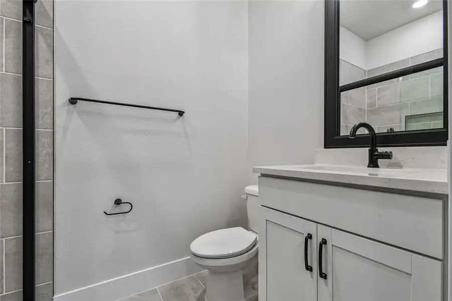 Furnished interior view inside a new home in Towns at Union, St. Petersburg (Image 19).