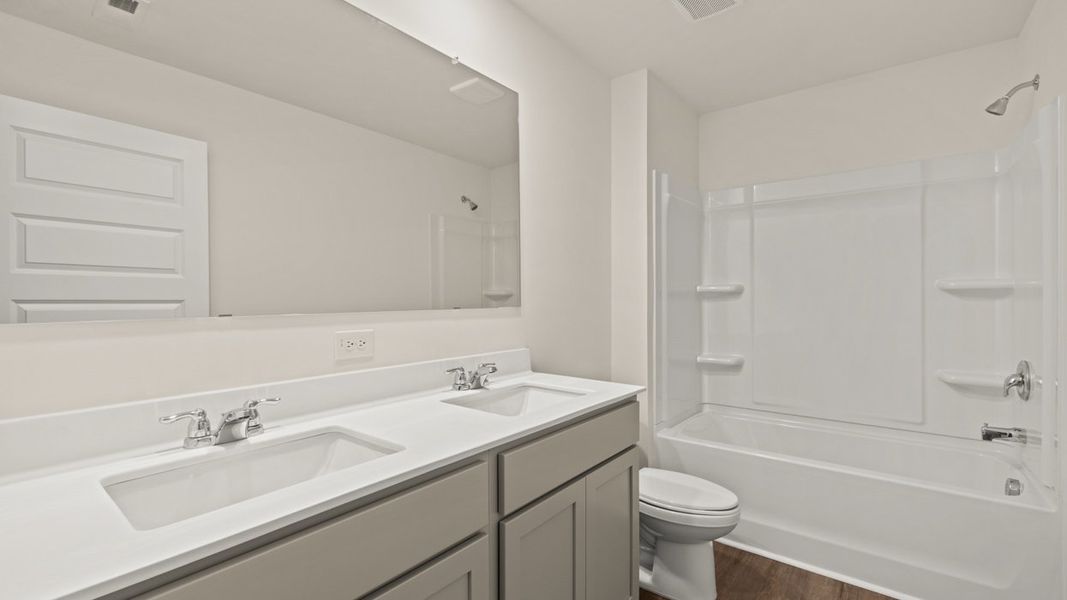 Representative furnished interior of a home built from the Galen by D.R. Horton in The Reserve at Calcutta, Stockbridge (Image 9).