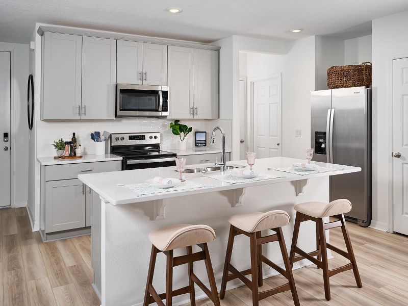 Furnished interior view inside a new home in Bradford Park, Ormond Beach (Image 5).