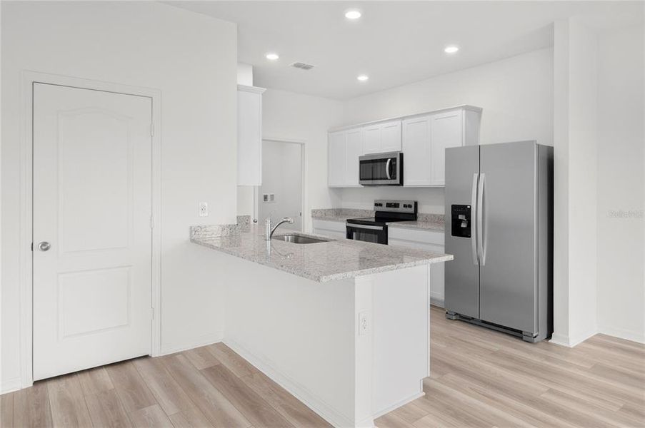 Furnished interior view inside a new home in Citrus Place, Babson Park (Image 9).