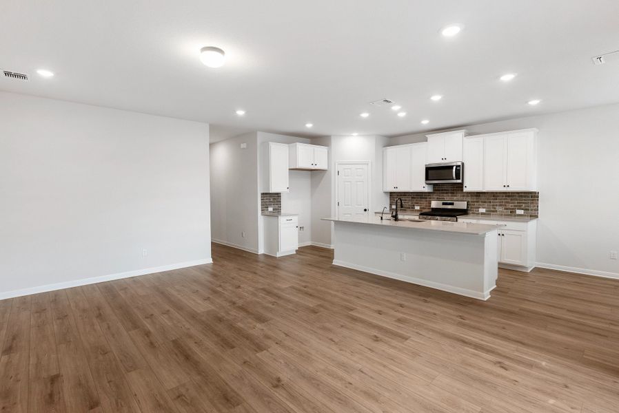 Representative unfurnished interior of a home built from the Cartwright by Ashton Woods in Rolling Glen, Hutto (Image 10).