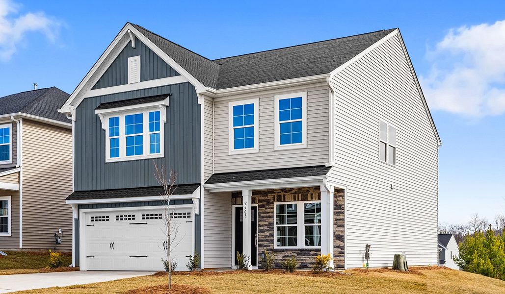 Front exterior of a new home in Hanes Lake, Winston-Salem, NC, highlighting curb appeal (Image 17).