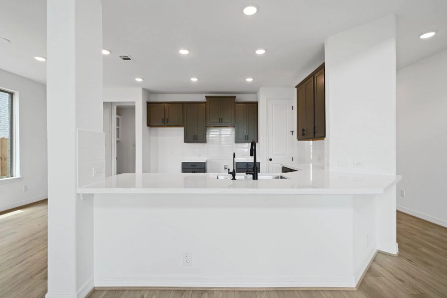 Kitchen. Note: Sample product photo - actual exterior and interior selections may vary by homesite Kitchen. Note: Sample product photo - actual exterior and interior selections may vary by homesite