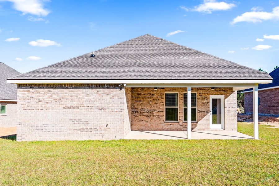 Exterior details and patio area of a home in Young Oaks, Crestview (Image 3).