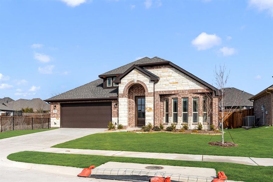 Front exterior of a new home in Liberty, Melissa, TX, highlighting curb appeal (Image 24).