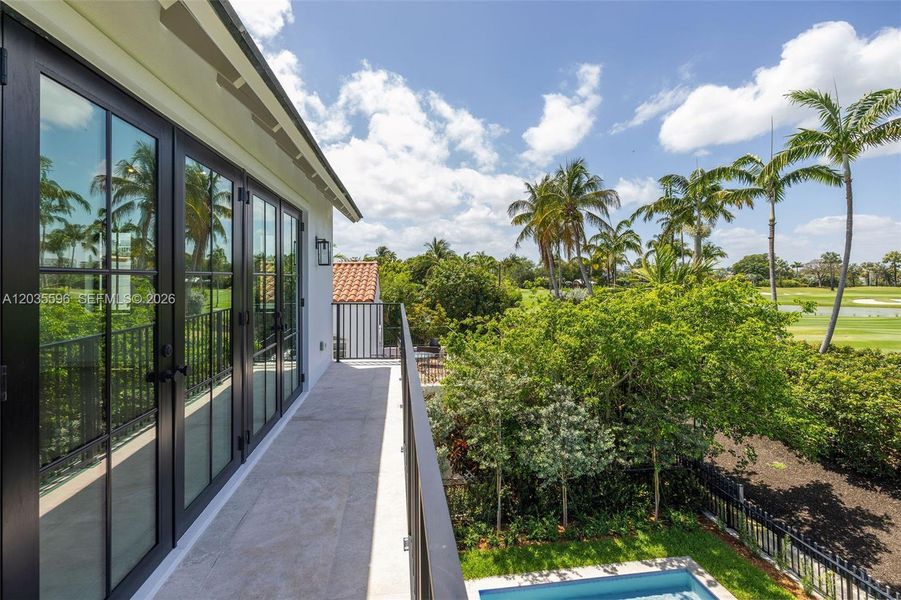 Primary bedroom balcony overlooks gold course Primary bedroom balcony overlooks gold course