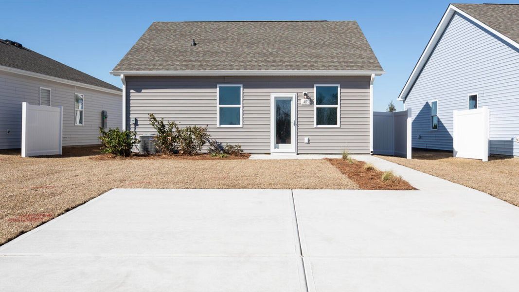 Representative exterior photo of a completed home built from the PERRY by D.R. Horton in The Cottages at Blake Farm, Wilmington, NC (Image 3).