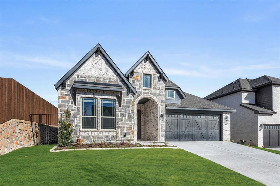Front exterior of a new home in The Lakes at Parks of Aledo, Aledo, TX, highlighting curb appeal (Image 25).