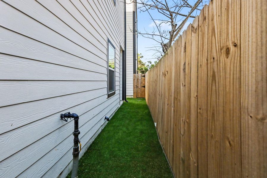 Exterior details and patio area of a home in , Houston (Image 25). Exterior details and patio area of a home in , Houston (Image 25).