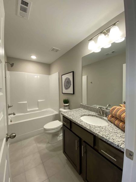 Furnished interior view inside a new home in The Grove at Kennesaw Farms, Gallatin (Image 29). Furnished interior view inside a new home in The Grove at Kennesaw Farms, Gallatin (Image 29).