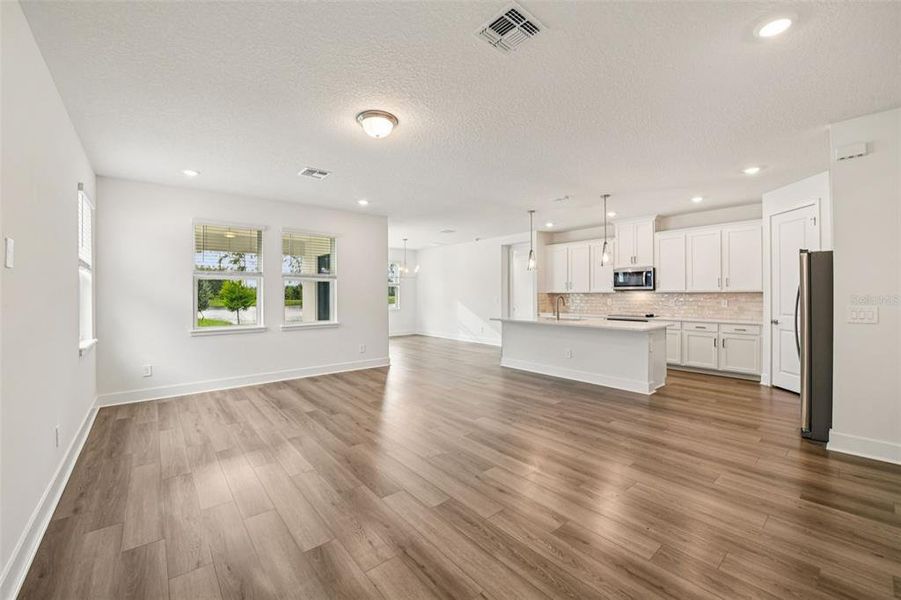 Spacious, unfurnished interior of a new home in Legends Preserve - Signature Series, Daytona Beach (Image 16).