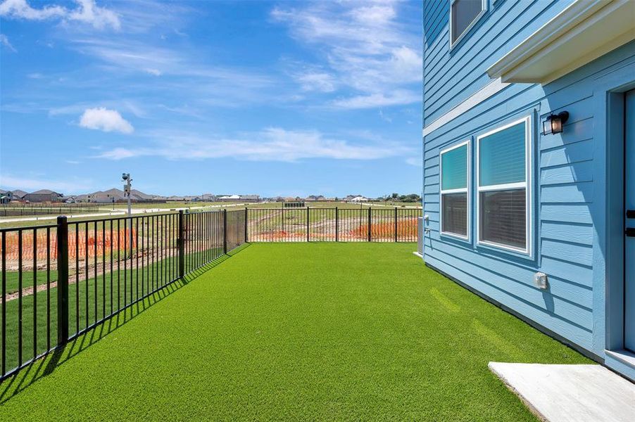 Exterior details and patio area of a home in Providence Commons, Providence Village (Image 3).