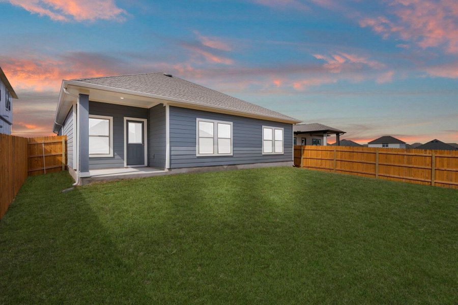 Rear of Home and Private Backyard