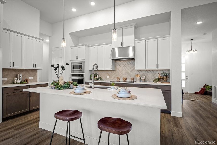 Furnished interior view inside a new home in Cloverleaf - Pinnacle Collection, Monument (Image 32).