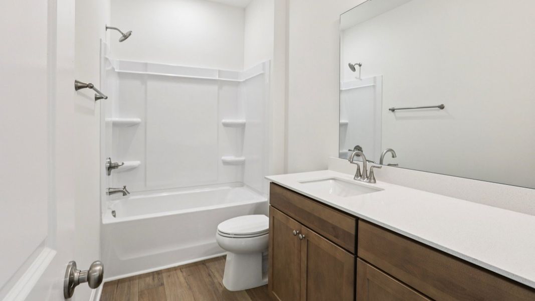 Pendleton home plan secondary bathroom with large vanity and shower Pendleton home plan secondary bathroom with large vanity and shower