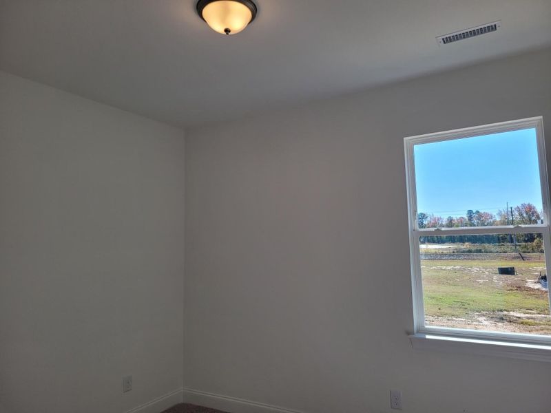 Spacious, unfurnished interior of a new home in 1158 Place, Wilson (Image 9).