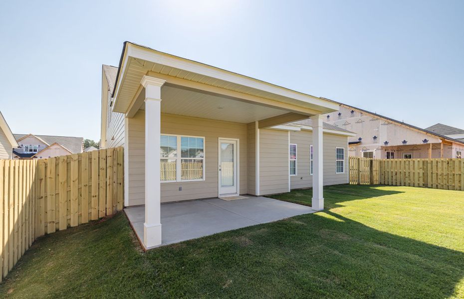 Front exterior of a new home in The Sanctuary, Aiken, SC, highlighting curb appeal (Image 26). Front exterior of a new home in The Sanctuary, Aiken, SC, highlighting curb appeal (Image 26).
