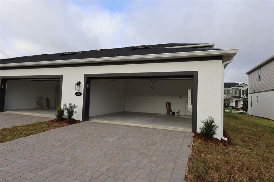 Exterior details and patio area of a home in Emerson Pointe, Apopka (Image 3). Exterior details and patio area of a home in Emerson Pointe, Apopka (Image 3).