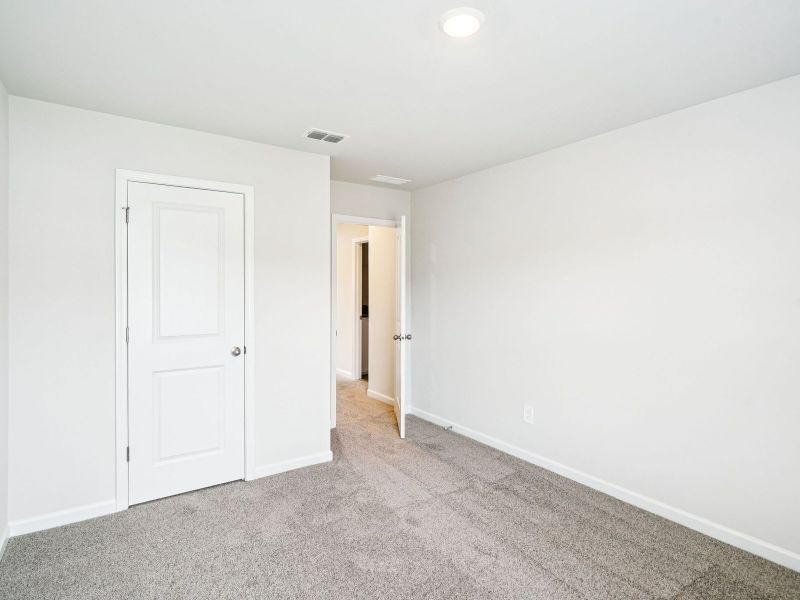 Spacious, unfurnished interior of a new home in Creekside at Oxford Park, Fairburn (Image 20).