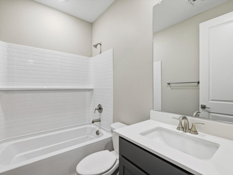 Furnished interior view inside a new home in Entrada Signature Series, Tolleson (Image 7).