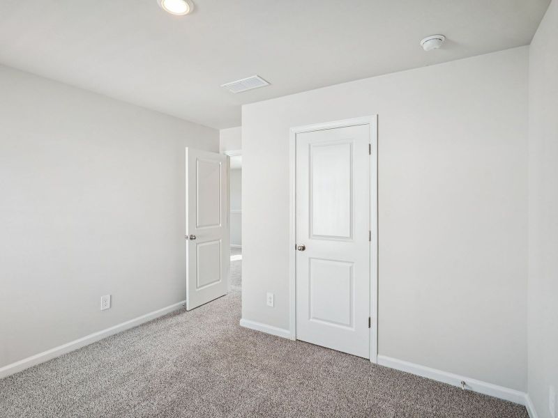 Spacious, unfurnished interior of a new home in Hemingway - Reserve Series, Cumming (Image 18). Spacious, unfurnished interior of a new home in Hemingway - Reserve Series, Cumming (Image 18).
