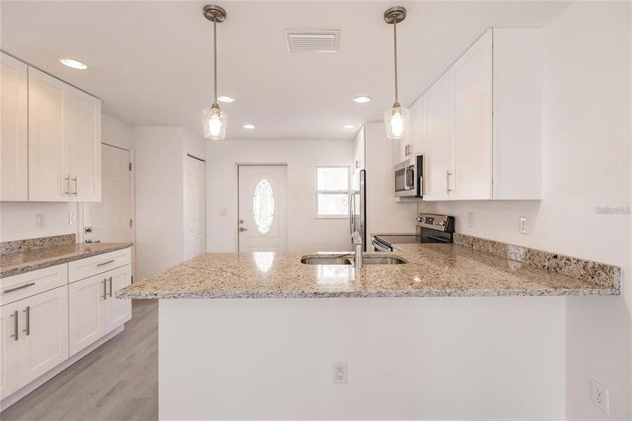 Furnished interior view inside a new home in , Punta Gorda (Image 9).