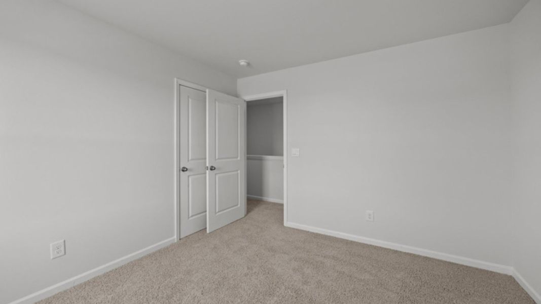 Spacious, unfurnished interior of a new home in Villa Grande, Winterville (Image 31).