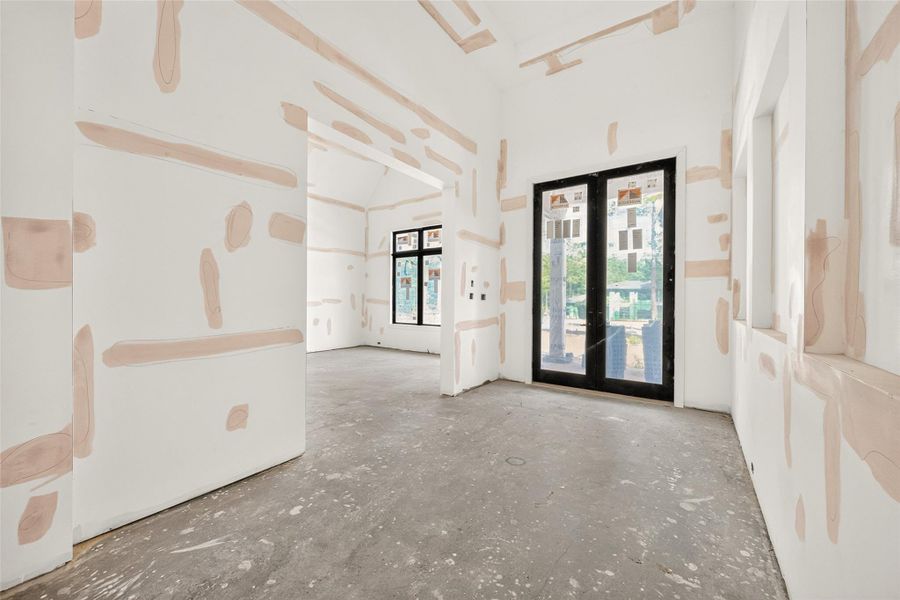 The entry is equipped with three 42'' niches and features a ceiling height of 16'.