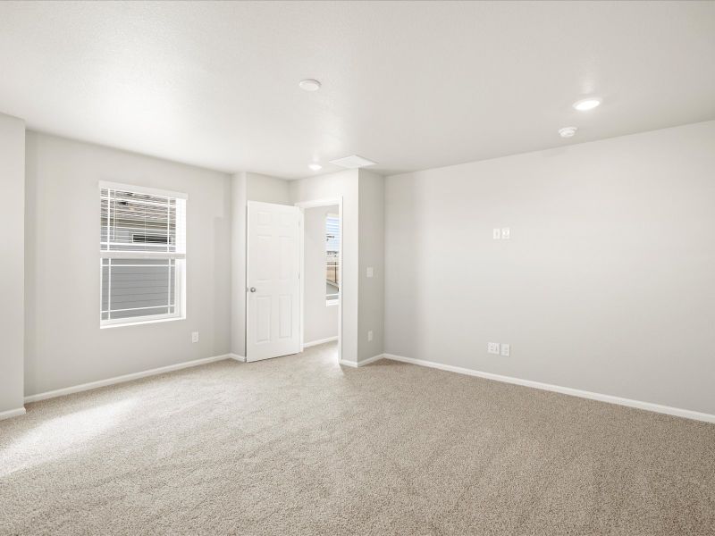 Spacious, unfurnished interior of a new home in Buffalo Highlands: The Flora Collection, Commerce City (Image 14).