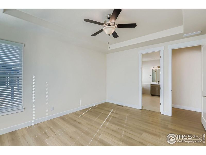 Spacious, unfurnished interior of a new home in RainDance National 60/70, Windsor (Image 24).