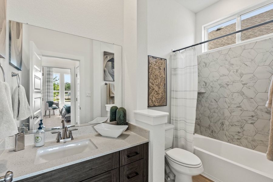 Furnished interior view inside a new home in The Grove at Blackhawk, Pflugerville (Image 55). Furnished interior view inside a new home in The Grove at Blackhawk, Pflugerville (Image 55).