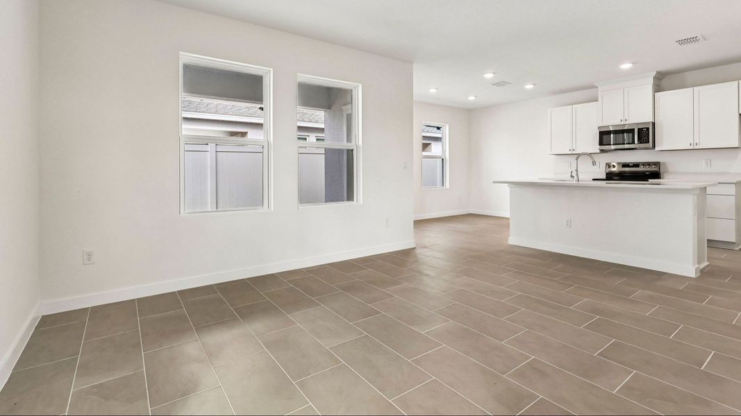 Furnished interior view inside a new home in Cyrene at Harmony, St. Cloud (Image 6).
