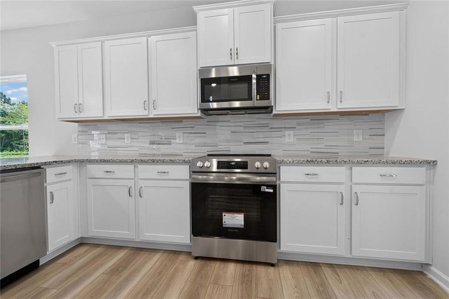 Furnished interior view inside a new home in Sycamore Crest, Calhoun (Image 11).