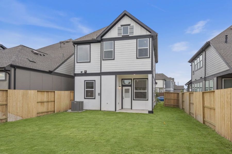 Representative exterior details of a home built from the Chantilly 2 by Chesmar Homes in Meridiana Chateau, Manvel (Image 3).